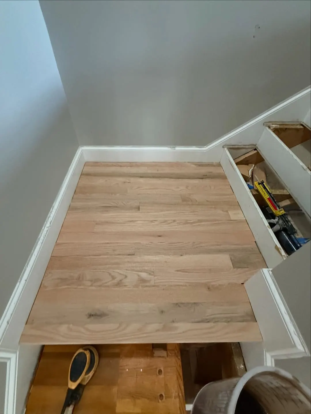 New unfinished oak boards on the stair landing