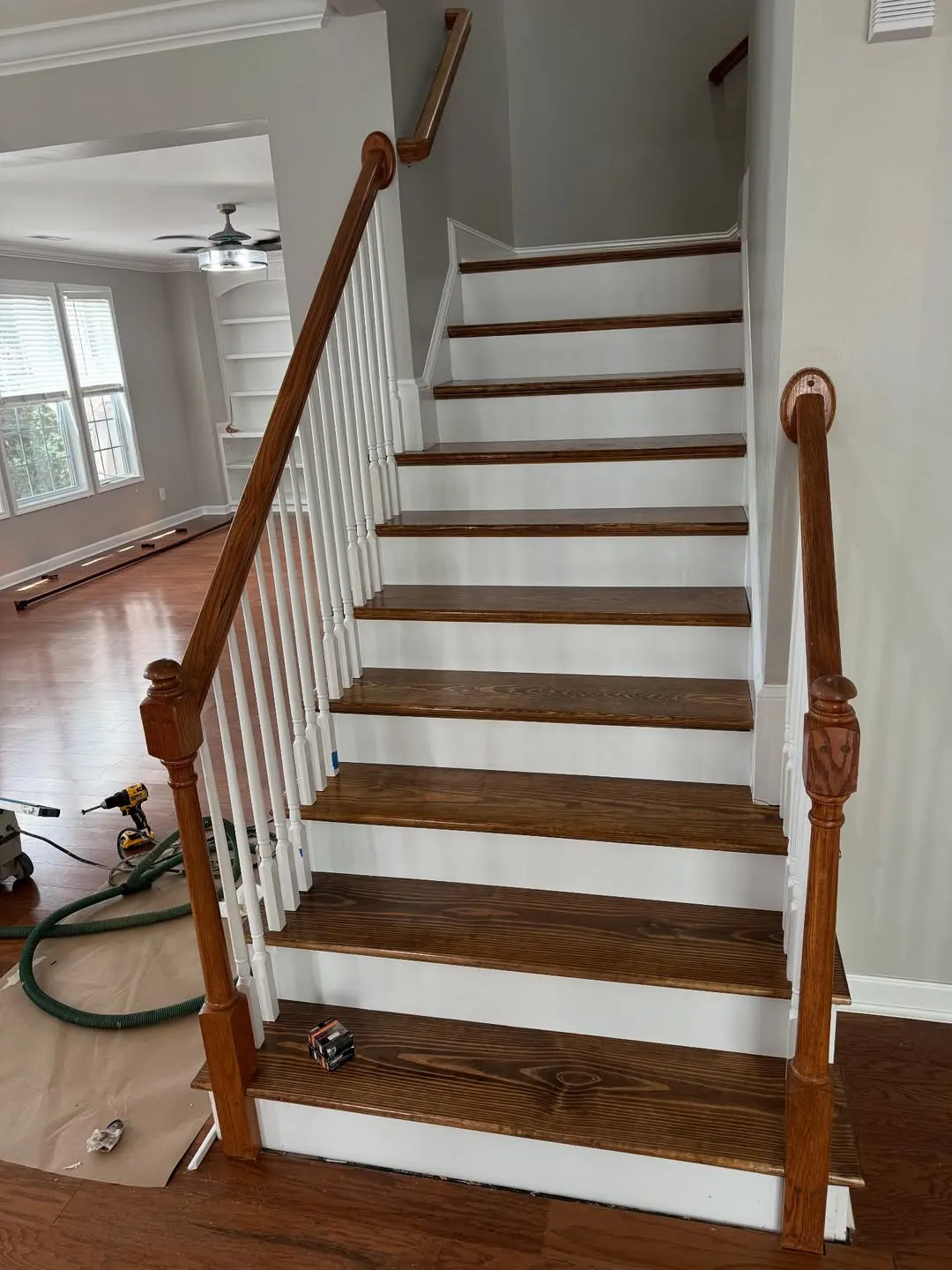 Finished staircase with stained treads and white risers
